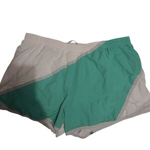 Nike Dri-Fit Women’s Color-block Running Shorts featuring a Tie/Elastic Waist